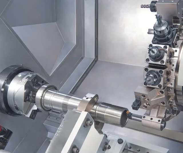 Biglia B1250 - тяжёлый CNC токарный центр для длинных валов с подвижным люнетом и 16-позиционной турелью прямого привода
